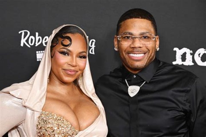 Ashanti Showers Nelly With Love For Father's Day In Adorable On-Stage Moment
