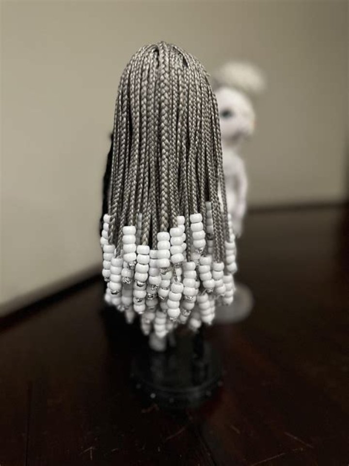 Big Sean Poses Next To Portrait Of Himself Designed In Girl's Hair Beads