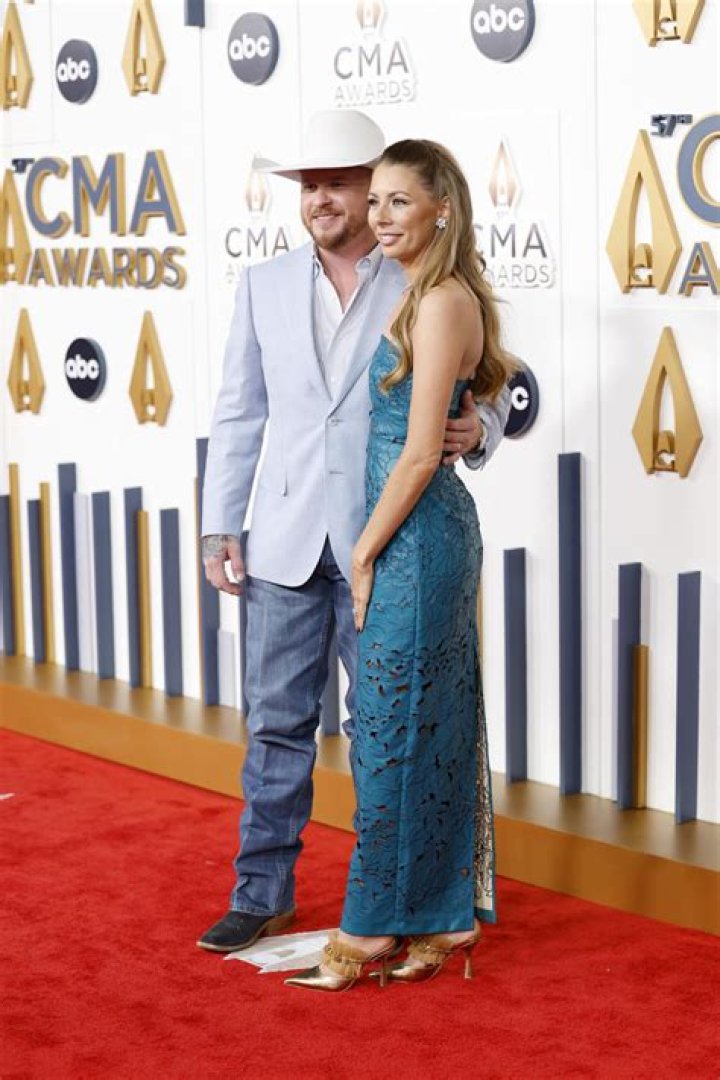 Cody Johnson and Wife Brandi Johnson Color Coordinate on the 2023 CMA Awards Red Carpet: Photos