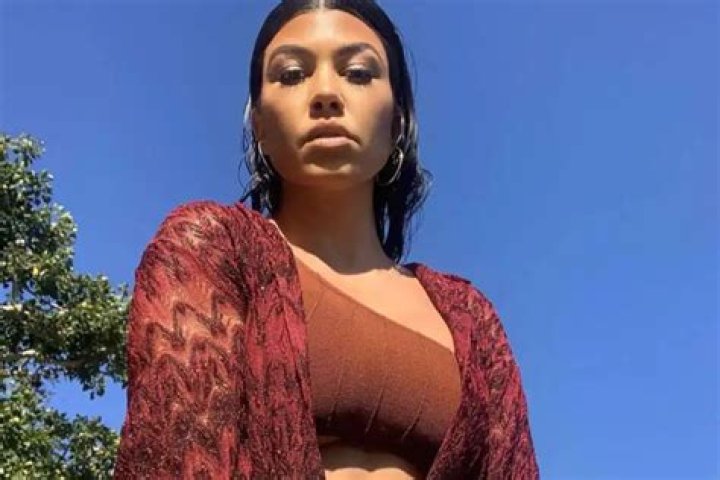 Kourtney Kardashian Flaunts Her Curves In Blue Microkini With Addison Rae As Some Say The Photos Are Weird