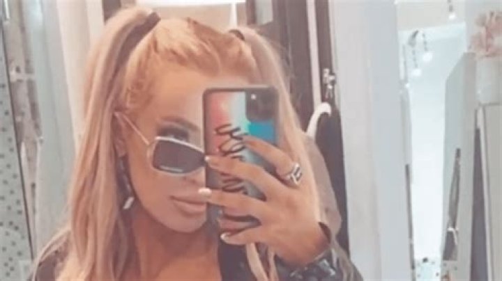 Tana Mongeau Rocks a Sexy All-Black Outfit With ’90s-Inspired Hair and ‘Bible’ Earrings