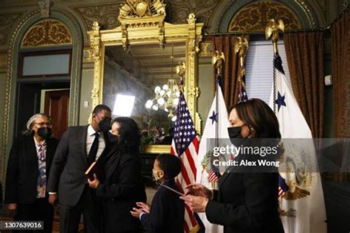 Who is Melvina Regan, wife of Michael S. Regan?