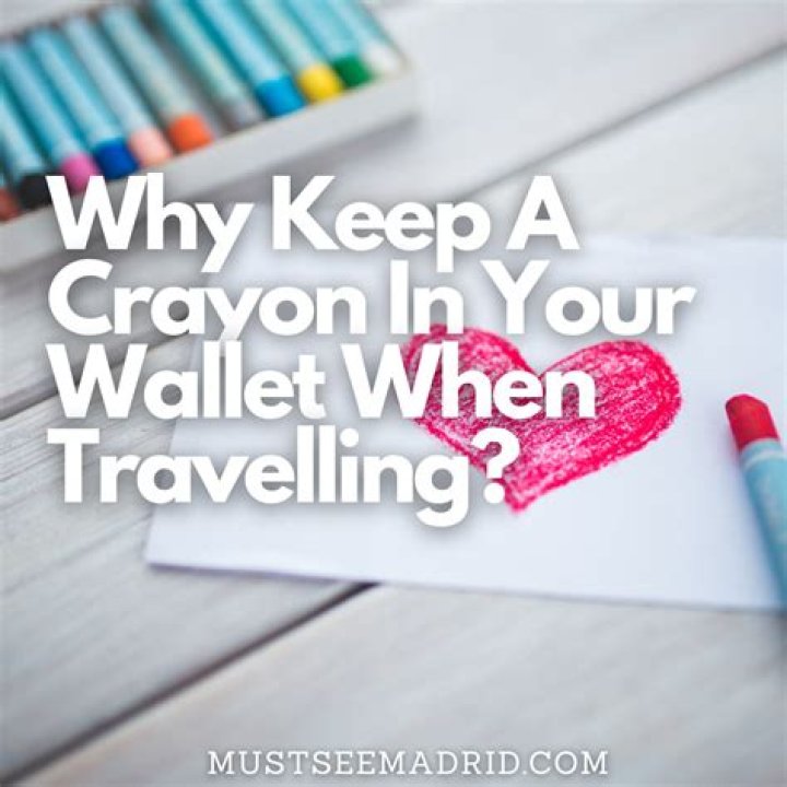 Why do you put a crayon in your wallet when traveling?